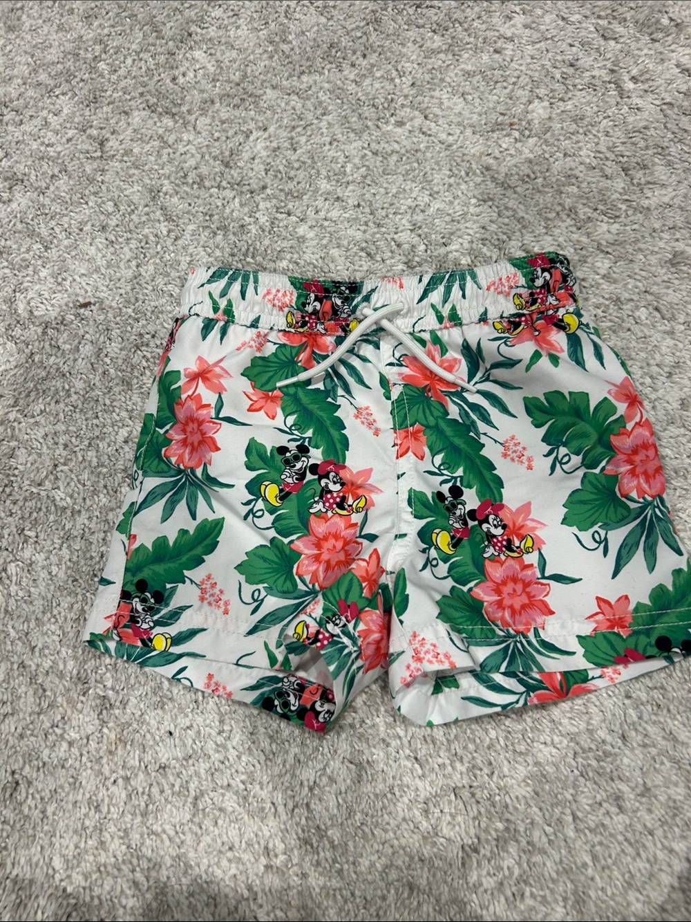 Janie and Jack x Disney White Swim Trunks with Green Leaves & Pink Floral Print